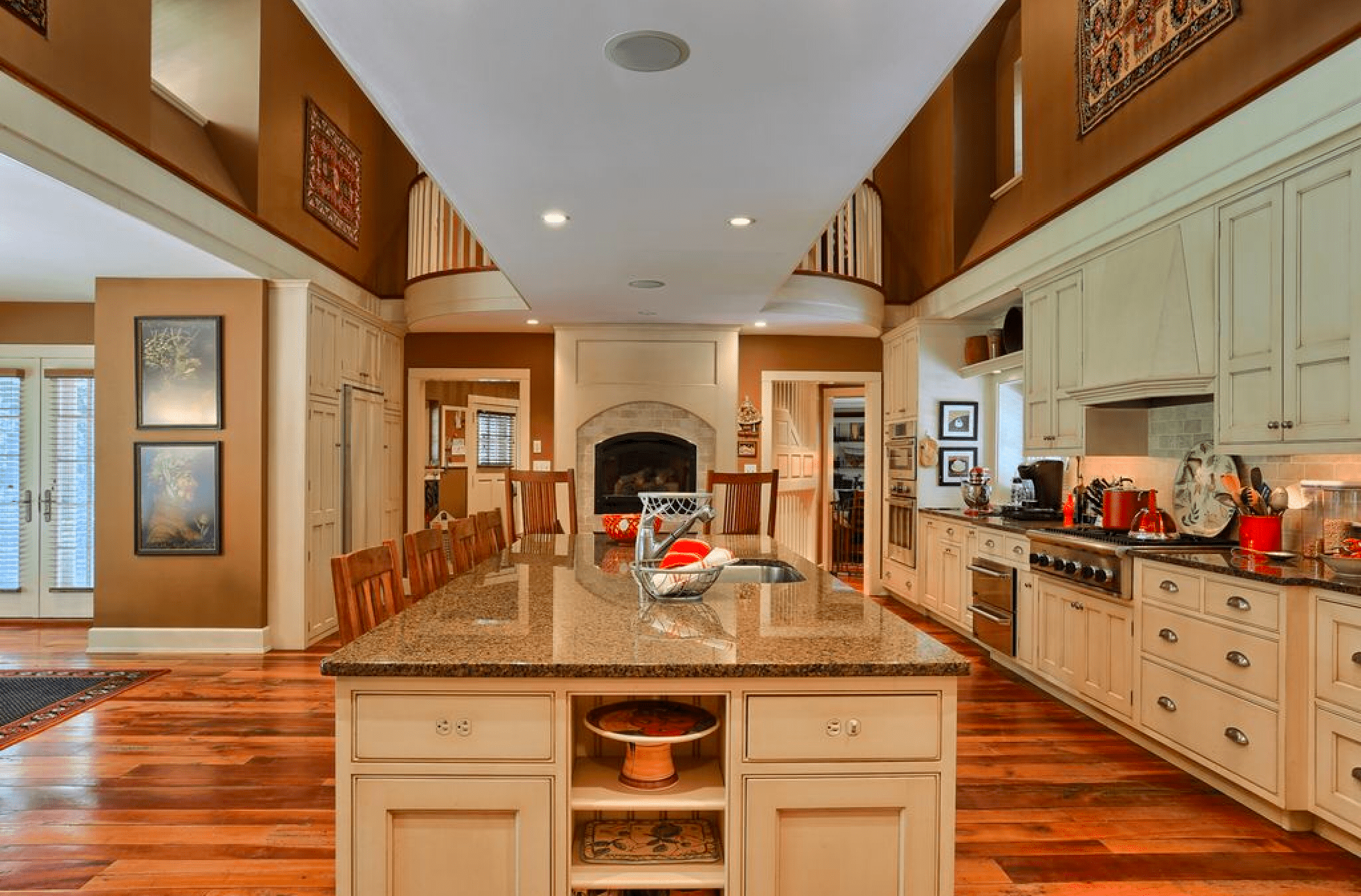 Kitchen island lined up with fireplace