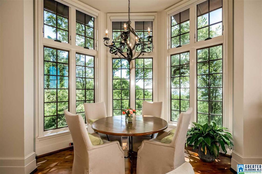 Breakfast nook with steel and glass windows